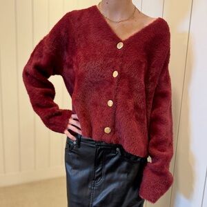 Fuzzy maroon rust colored cardigan